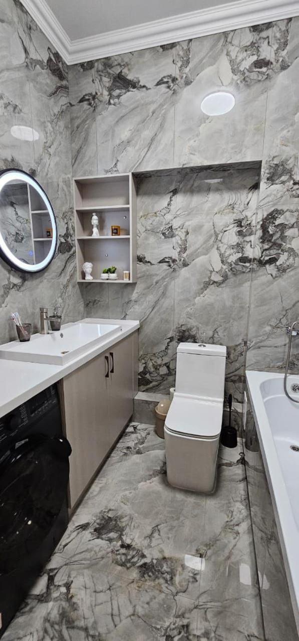 77 с панорамными окнами вид на горы Apartment Almaty